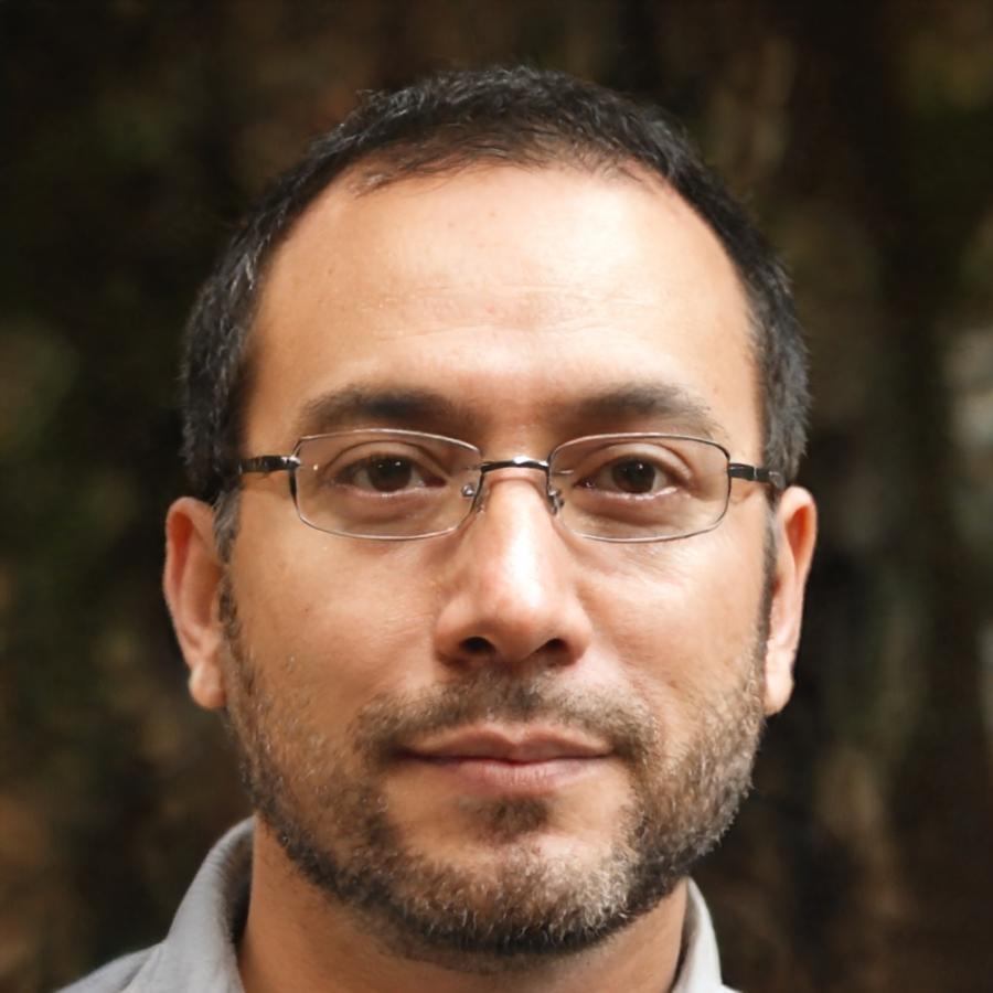 Professional headshot of Julian Reeves, Business Systems Specialist